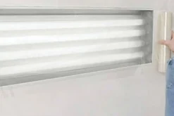 RBL Products 435 24 X 100 Continuous Roll Self-Adhering Clear Plastic Film - Perforated Every 24 Along Length